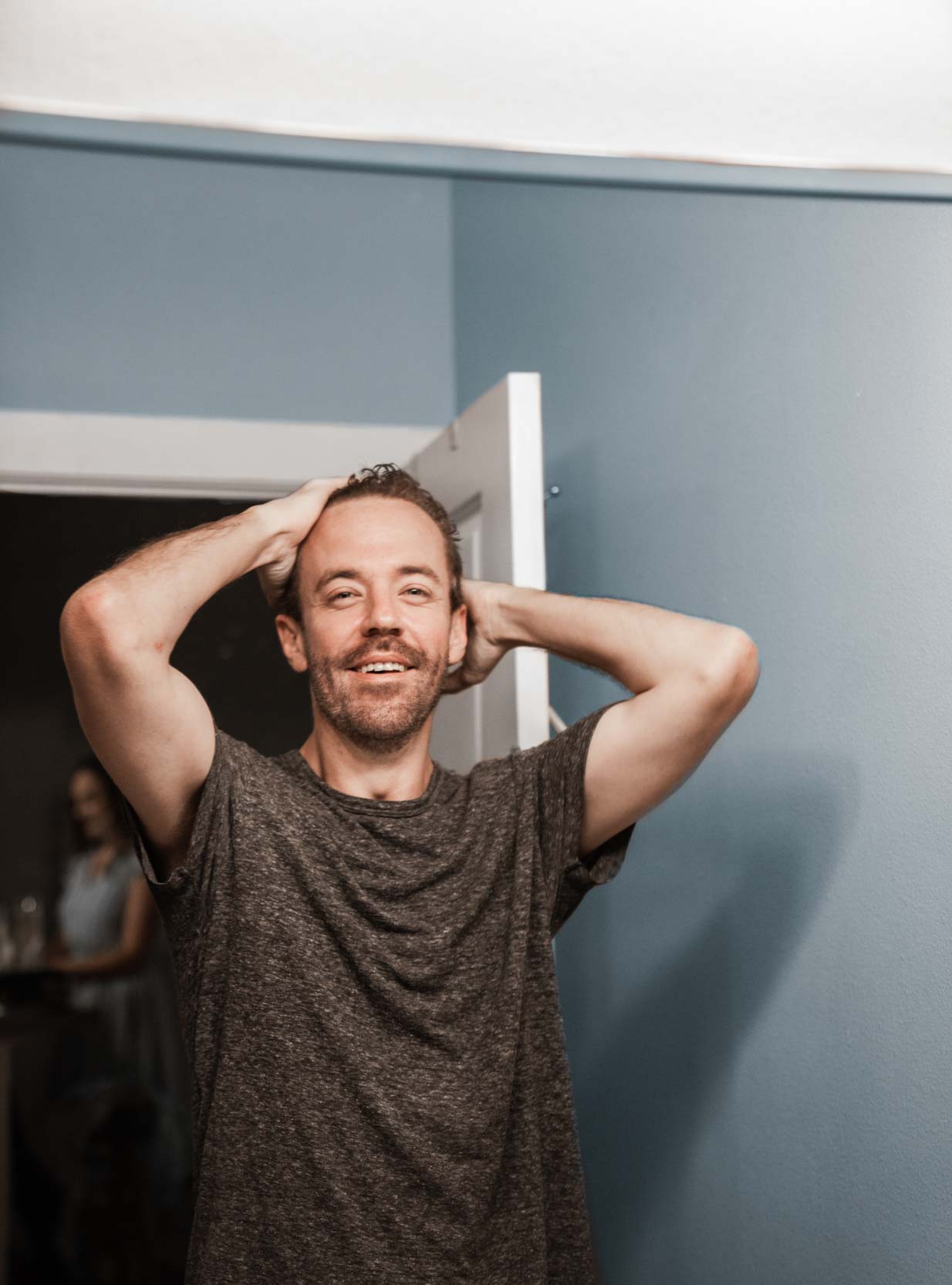 Groom in his bathroom getting ready for his wedding day